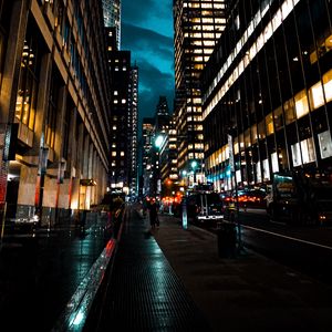 Preview wallpaper street, city, dark, buildings, skyscrapers