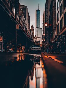 Preview wallpaper street, city, reflection, puddle, cars, buildings, bicycles