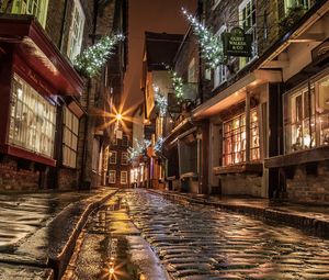 Preview wallpaper street, houses, road, paving, windows, lights, shopping, evening, night, england, christmas, new year