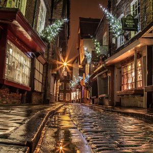 Preview wallpaper street, houses, road, paving, windows, lights, shopping, evening, night, england, christmas, new year