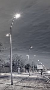 Preview wallpaper street, lights, fence, night, rain