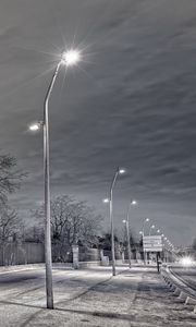 Preview wallpaper street, lights, fence, night, rain