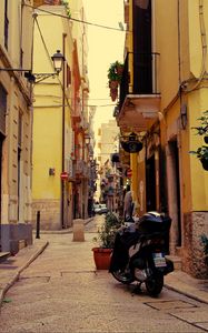 Preview wallpaper street, motorcycle, pavement, buildings, architecture