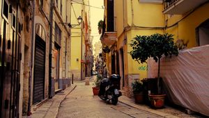 Preview wallpaper street, motorcycle, pavement, buildings, architecture