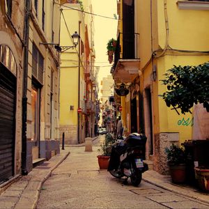 Preview wallpaper street, motorcycle, pavement, buildings, architecture