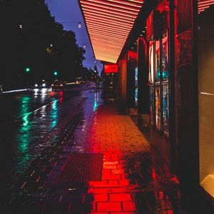 Preview wallpaper street, night, city lights, buildings, tile, road, stockholm, sweden