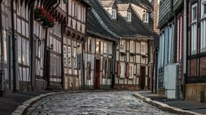 Preview wallpaper street, paving stones, buildings, architecture, roofs