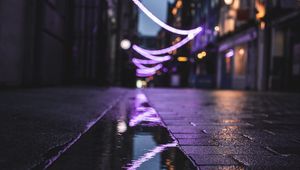 Preview wallpaper street, puddle, reflection, garlands, lights