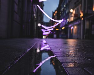 Preview wallpaper street, puddle, reflection, garlands, lights