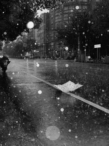 Preview wallpaper street, rain, bw, umbrella, asphalt, wet