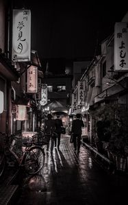 Preview wallpaper street, rain, signboards, hieroglyphs, people, dark