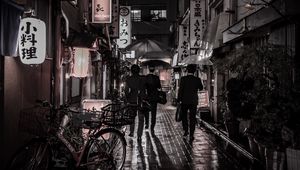 Preview wallpaper street, rain, signboards, hieroglyphs, people, dark