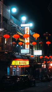 Preview wallpaper street, signs, night, cars, lanterns, dark