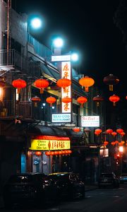 Preview wallpaper street, signs, night, cars, lanterns, dark