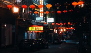 Preview wallpaper street, signs, night, cars, lanterns, dark