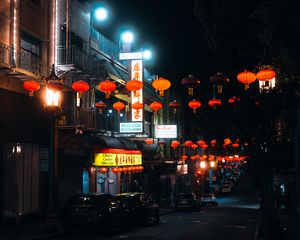 Preview wallpaper street, signs, night, cars, lanterns, dark