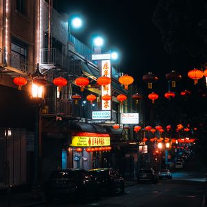 Preview wallpaper street, signs, night, cars, lanterns, dark