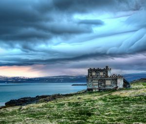 Preview wallpaper structure, coast, sea, clouds, cloudy