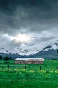 Preview wallpaper structure, grass, mountains, fog