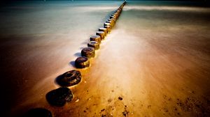 Preview wallpaper stubs, sand, coast, stones, water