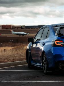 Preview wallpaper subaru, car, blue, airport