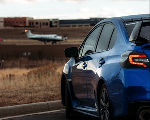 Preview wallpaper subaru, car, blue, airport