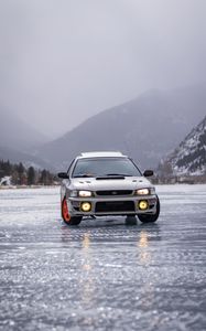 Preview wallpaper subaru, car, gray, front view, ice