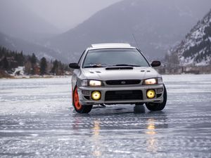 Preview wallpaper subaru, car, gray, front view, ice