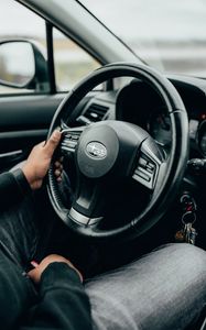 Preview wallpaper subaru, car, steering wheel, hands, black