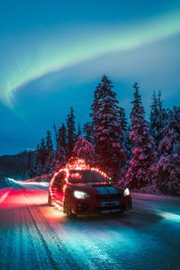 Preview wallpaper subaru sti, car, garlands, road, winter, night