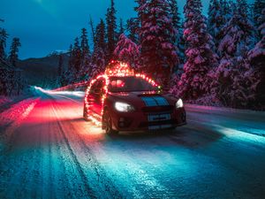 Preview wallpaper subaru sti, car, garlands, road, winter, night