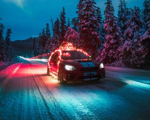 Preview wallpaper subaru sti, car, garlands, road, winter, night