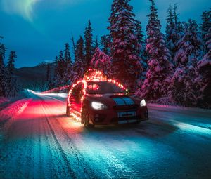 Preview wallpaper subaru sti, car, garlands, road, winter, night