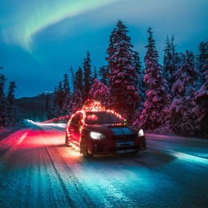 Preview wallpaper subaru sti, car, garlands, road, winter, night