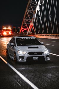 Preview wallpaper subaru wrx, subaru, car, sports car, front view, road, hieroglyphs