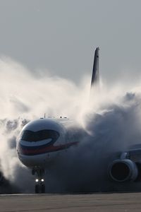 Preview wallpaper sukhoi, superjet, 100, aircraft, smoke, dust