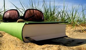 Preview wallpaper summer, vacation, book, glasses, bookmark, sand, grass