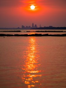 Preview wallpaper sun, buildings, silhouettes, water, sunset