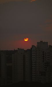 Preview wallpaper sun, buildings, skyscrapers, sunset