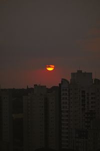 Preview wallpaper sun, buildings, skyscrapers, sunset