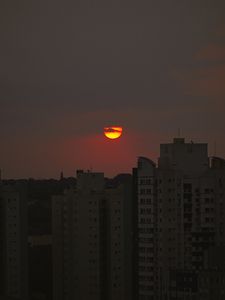 Preview wallpaper sun, buildings, skyscrapers, sunset