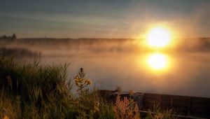 Preview wallpaper sun, disk, decline, coast, boat, mooring, vegetation, light