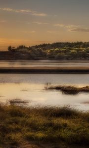 Preview wallpaper sun, light, lake, fisherman, coast, grass, faded, reflection