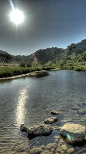 Preview wallpaper sun, light, river, water, transparent, stones, day, summer