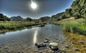 Preview wallpaper sun, light, river, water, transparent, stones, day, summer