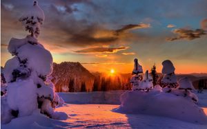 Preview wallpaper sun, mountains, clouds, snowdrifts, fur-trees, winter