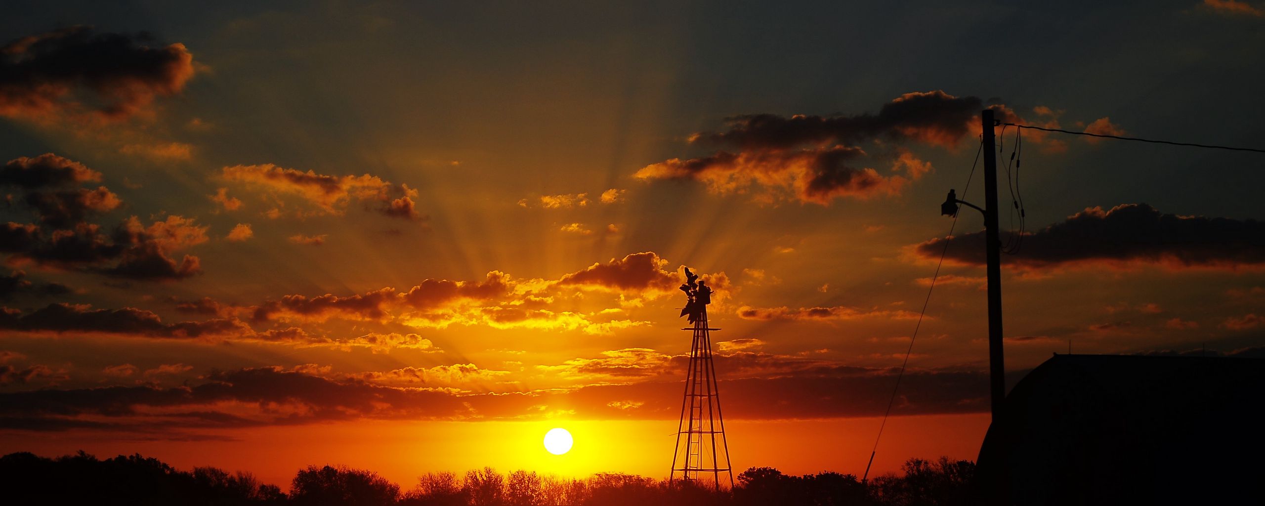 2560x1024 Wallpaper sun, rays, clouds, sky, sunset, dark, landscape