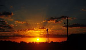 Preview wallpaper sun, rays, clouds, sky, sunset, dark, landscape