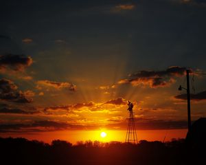Preview wallpaper sun, rays, clouds, sky, sunset, dark, landscape