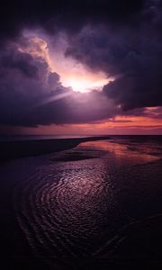 Preview wallpaper sun, rays, dusk, coast, clouds